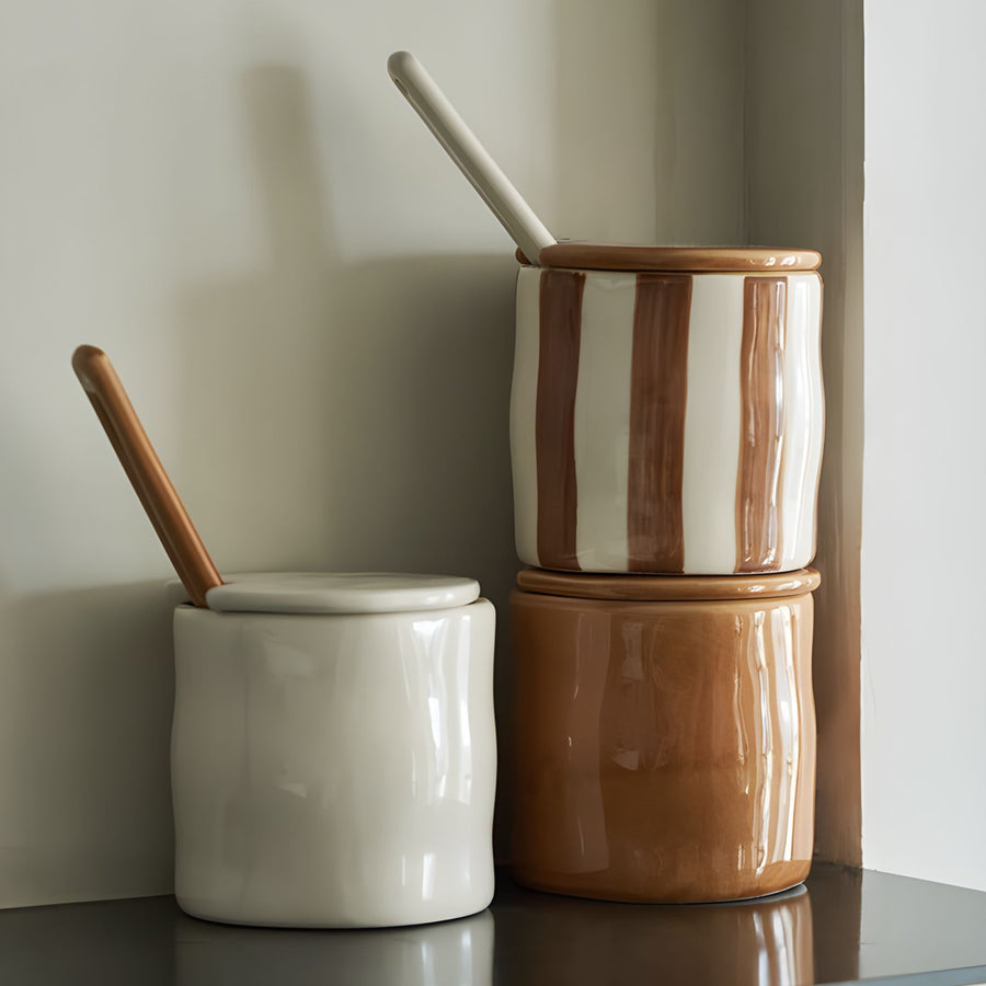 Set of artisanal ceramic containers, adding elegance and functionality to modern farmhouse home designs.