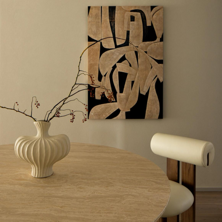 Textured ceramic vase in cream, ideal for modern minimalist and Scandinavian-inspired spaces.