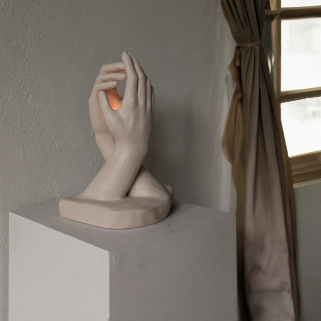 Minimalist candle holder styled in calm modern interior