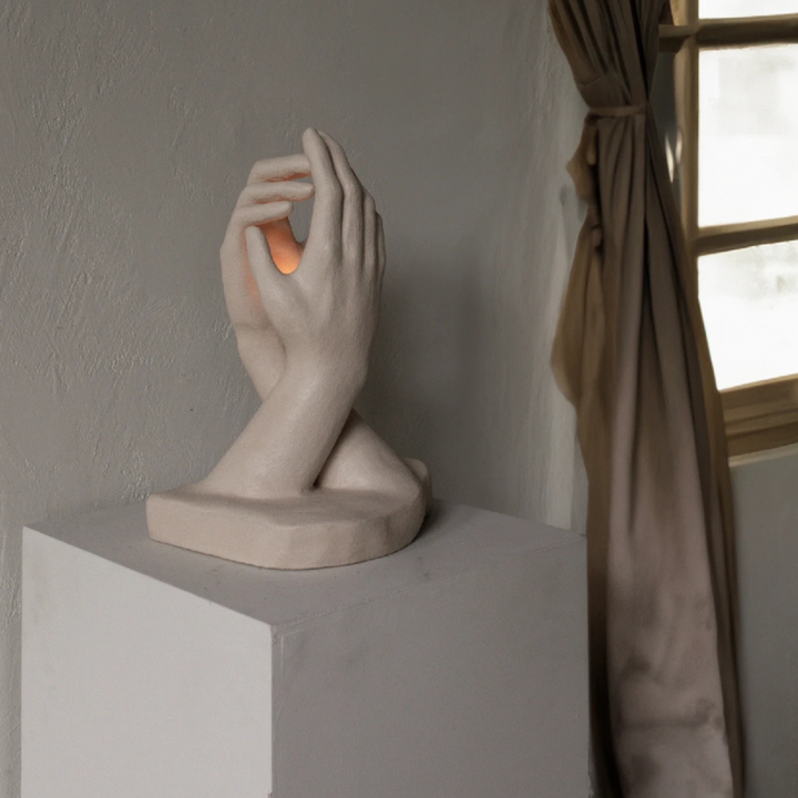 Minimalist candle holder styled in calm modern interior