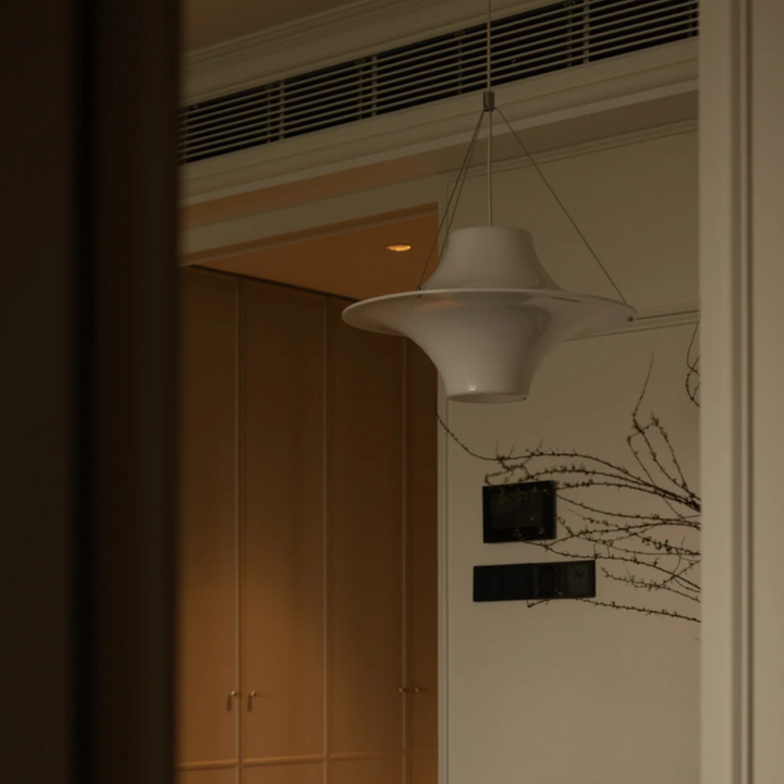 Contemporary home lighting with an elegant pendant light design, complementing modern interiors.