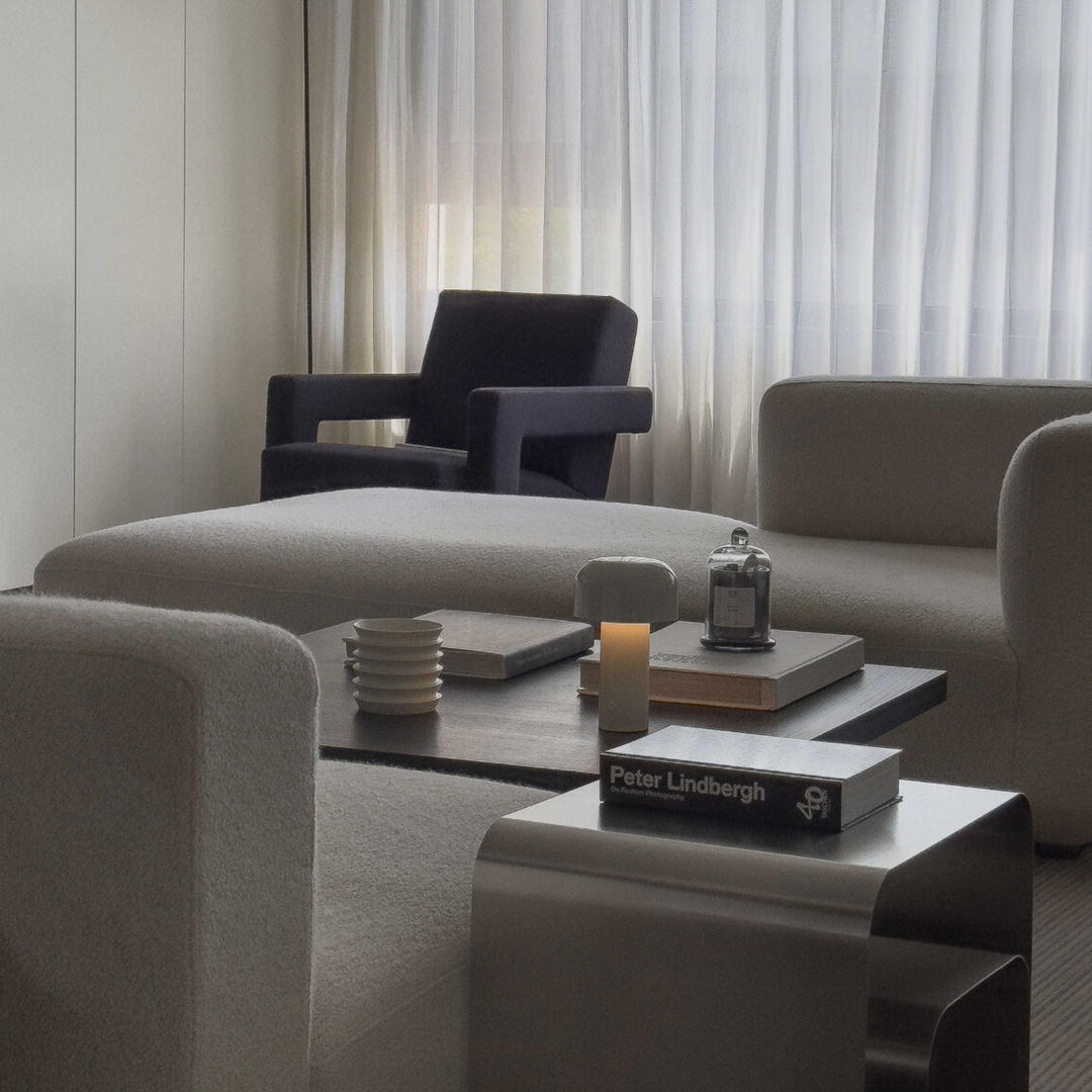 A cordless mushroom lamp enhancing a neutral, modern lounge interior.