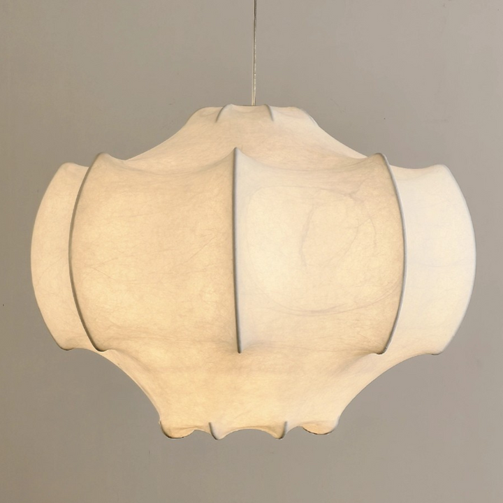 Detailed view of a handcrafted pendant lamp, showcasing the exquisite craftsmanship and elegant design details.