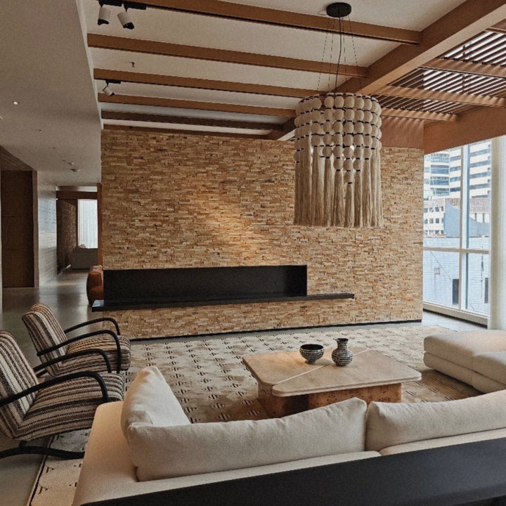 fringe pendant light made from cotton thread hanging in a modern natural living space.