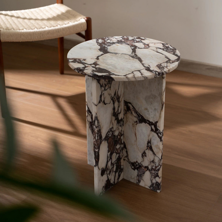 Japandi-style coffee table made of polished Italian marble, placed in modern neutral decor