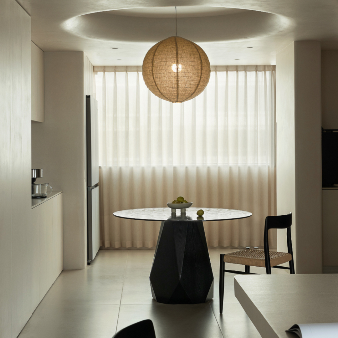 Japandi pendant light showing its soft linen fabric and curved shape