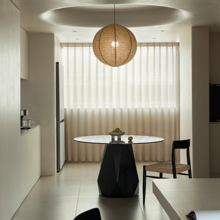 Japandi pendant light showing its soft linen fabric and curved shape