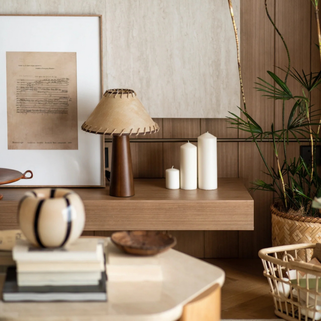 Mid-century modern living room with vintage table lamp, wooden side table, and minimalist decor