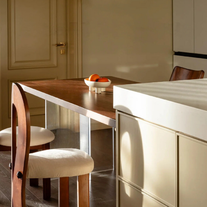 Sleek ceramic bowl in matte white, styled as a centerpiece in a modern kitchen. Functional and decorative design.