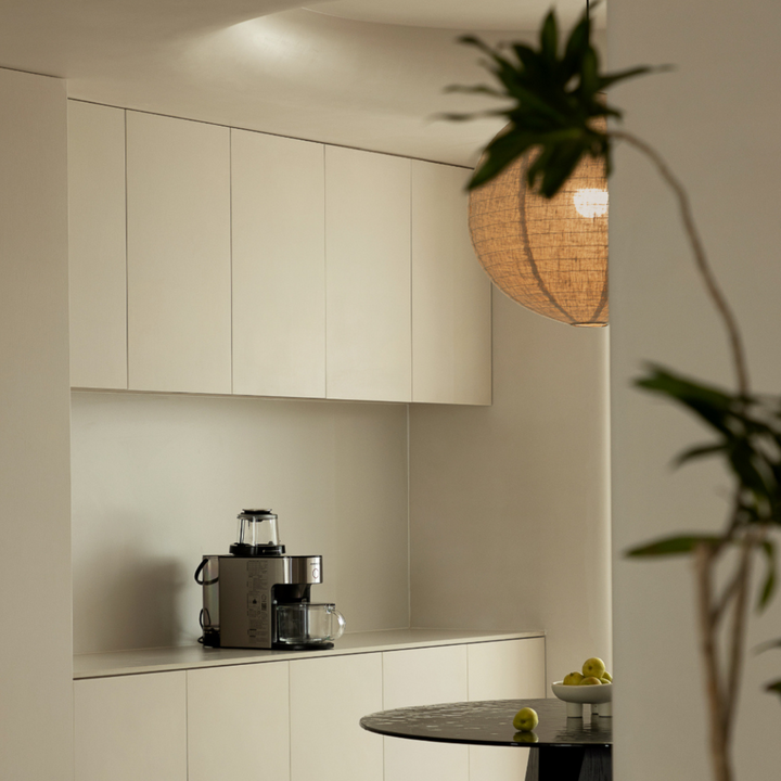 Minimalist pendant lamp in organic cotton-linen blend for modern interiors.