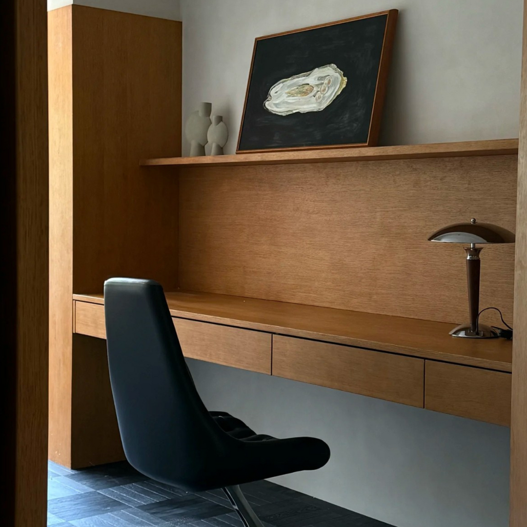 Modern apartment lighting enhanced by minimalist table lamp.