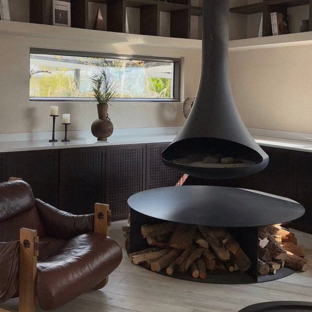 modern wooden vase positioned on a shelf adding organic texture to the interior.