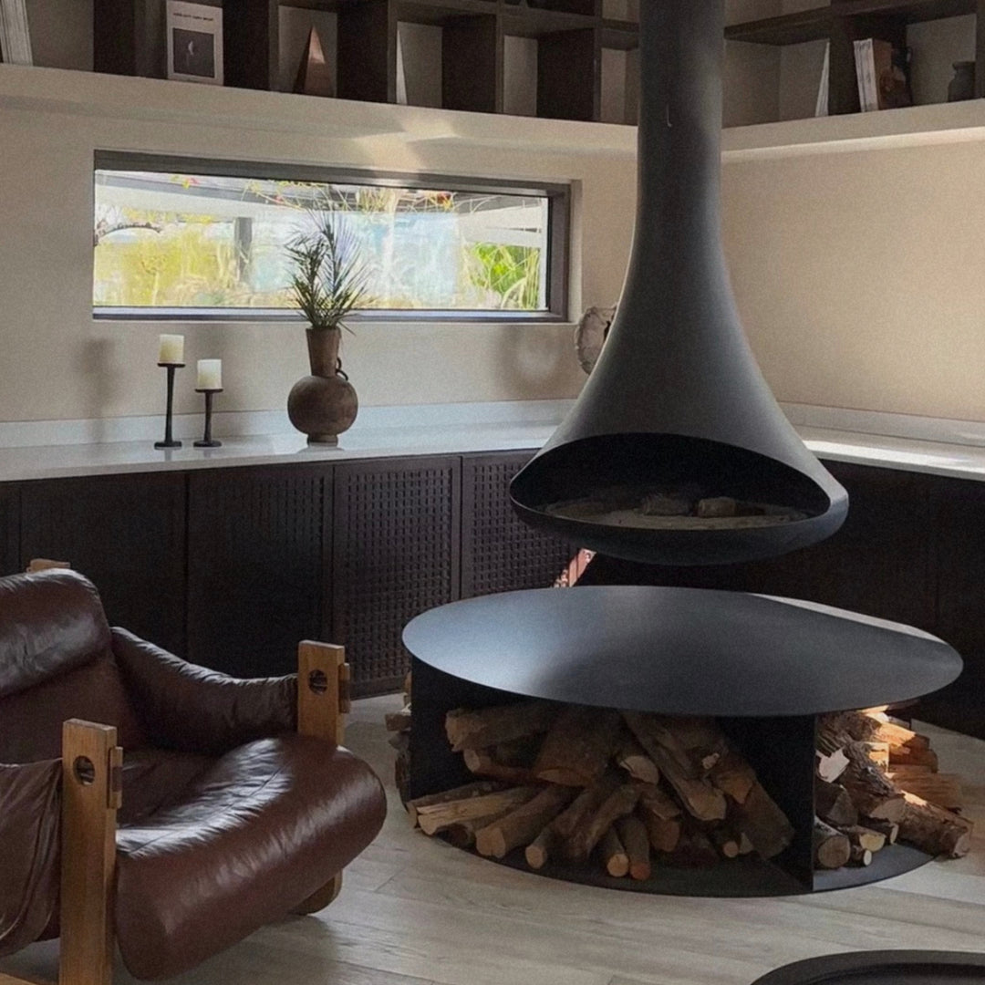 modern wooden vase positioned on a shelf adding organic texture to the interior.