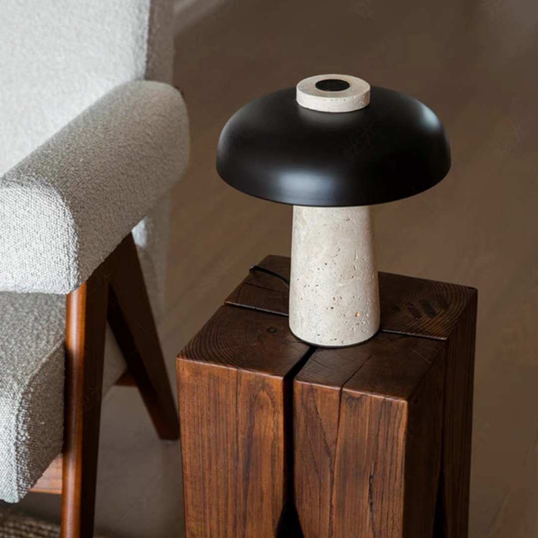 Organic travertine table lamp with a sleek black shade, perfect for modern decor.