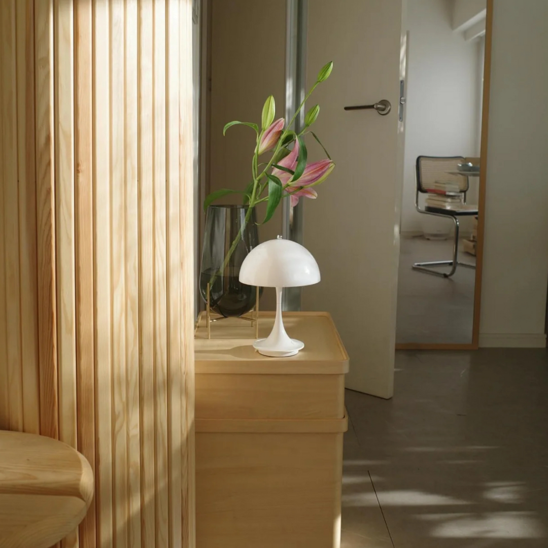 Scandinavian interior with a cordless mushroom table lamp, highlighting modern design with a soft, ambient light.