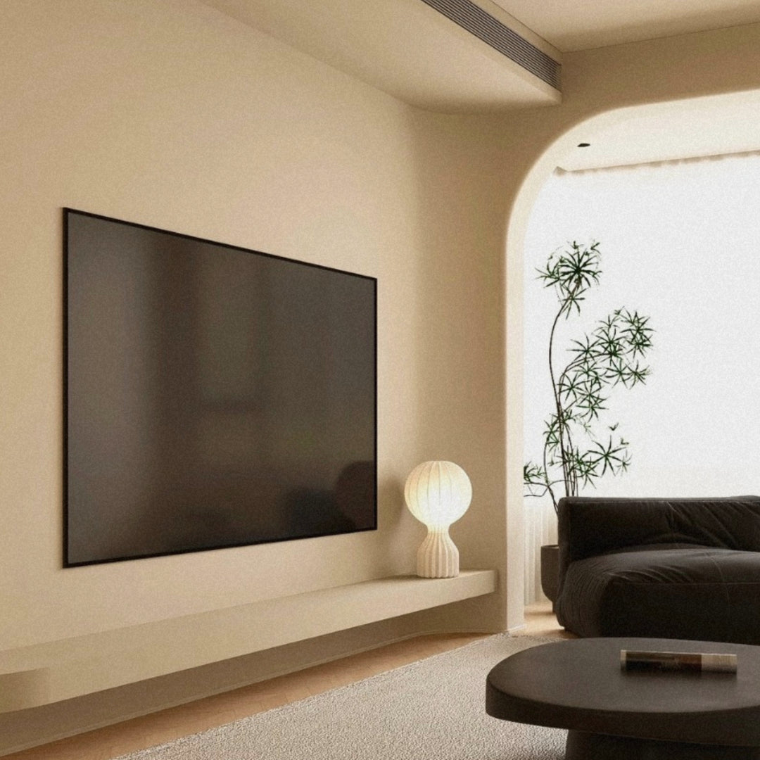 sculptural table lamp used as ambient lighting in a modern living room.