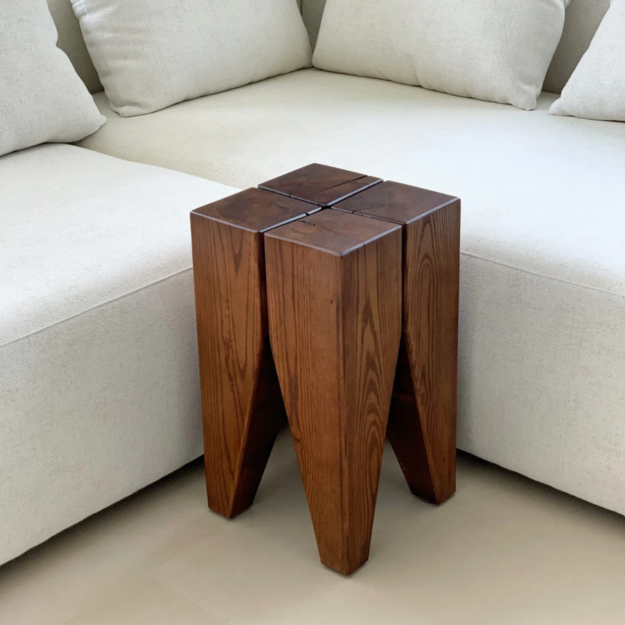 Classic wood stool with a sturdy design, perfect for versatile use.