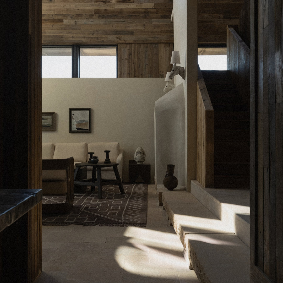 wooden vase placed within a modern interior adding subtle natural decor to the space.